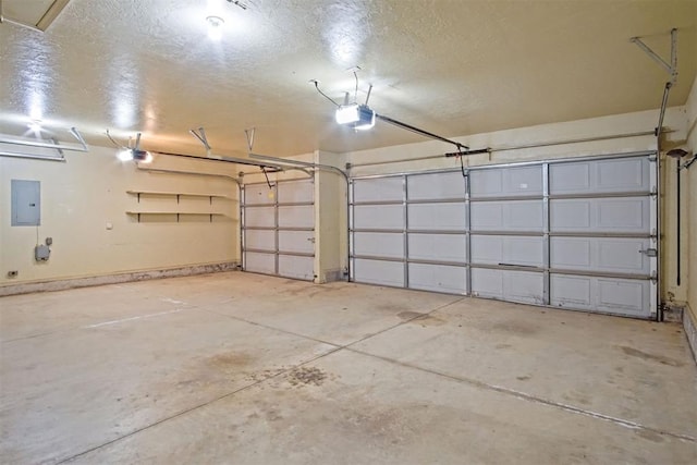 garage featuring a garage door opener and electric panel