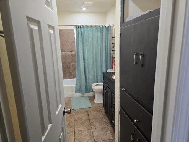 full bathroom with vanity, toilet, tile patterned flooring, and shower / bath combo