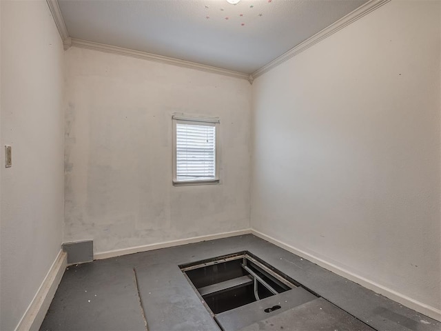 unfurnished room featuring ornamental molding