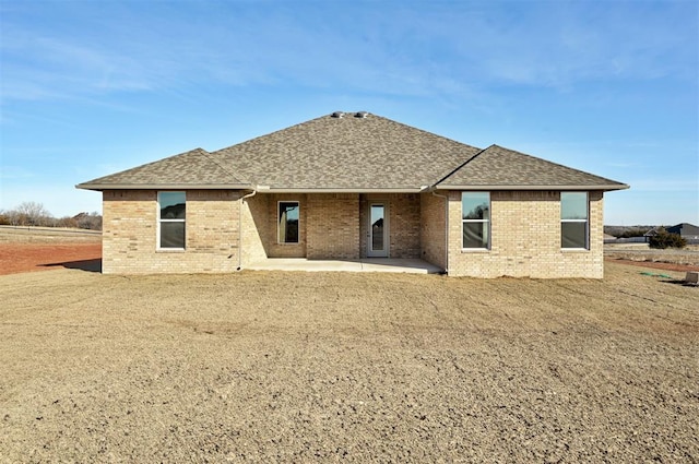 back of house with a patio area