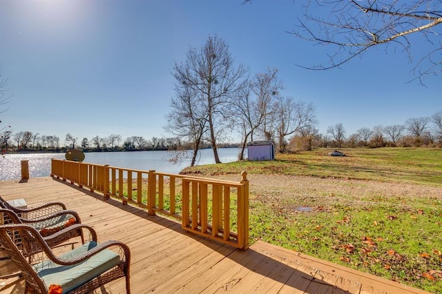 wooden deck with a water view