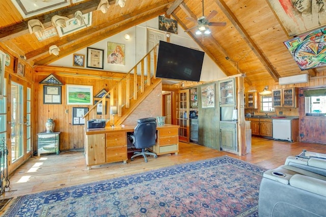 office space with wood ceiling, wooden walls, beam ceiling, and light wood-type flooring