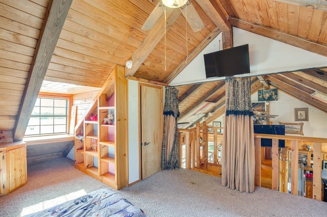 additional living space featuring vaulted ceiling with beams, wood ceiling, carpet floors, and ceiling fan