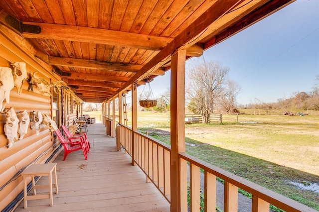 wooden deck featuring a rural view