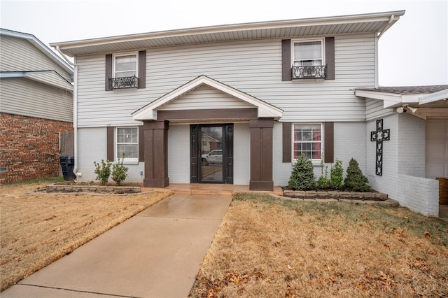 view of property with a front yard