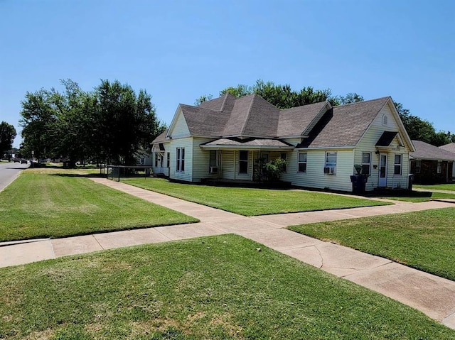 view of front of house with a front lawn