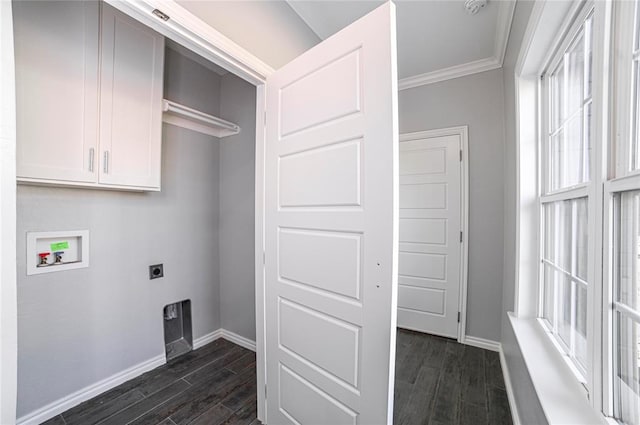 washroom with washer hookup, dark wood-type flooring, ornamental molding, and hookup for an electric dryer