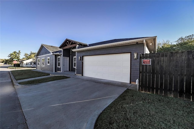 ranch-style house featuring a garage