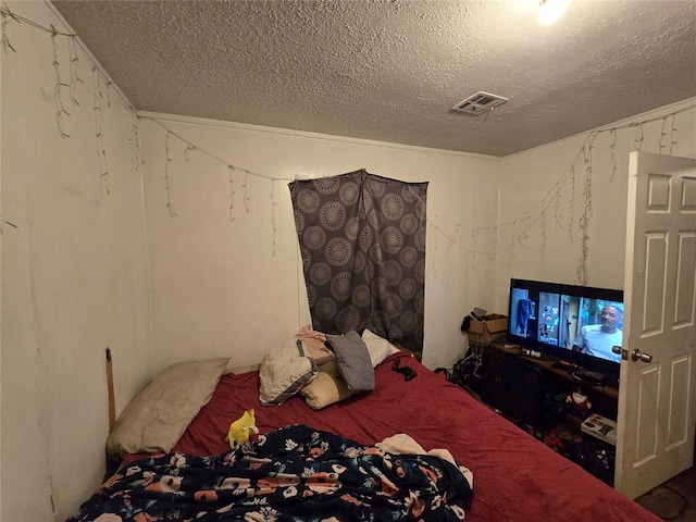 bedroom with a textured ceiling