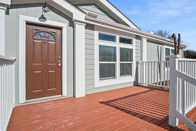 doorway to property with a wooden deck