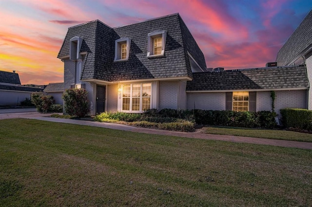 view of front of home featuring a yard