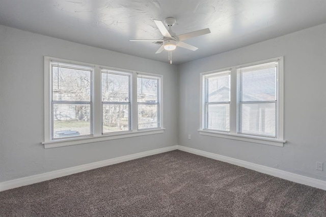 unfurnished room with carpet, plenty of natural light, and ceiling fan