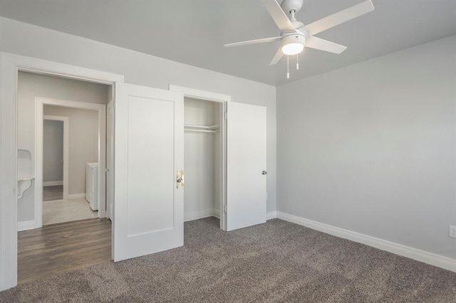 unfurnished bedroom with ceiling fan, a closet, washer / clothes dryer, and carpet