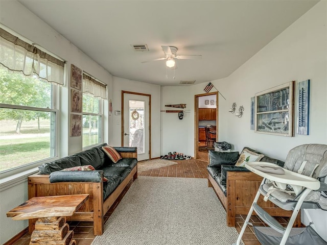 living room with ceiling fan