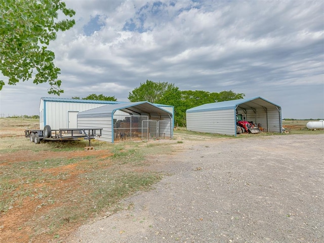 view of outdoor structure with a carport