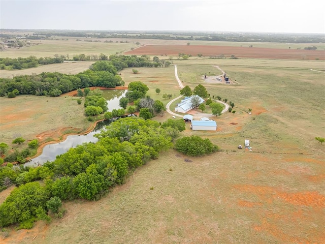 aerial view featuring a water view and a rural view