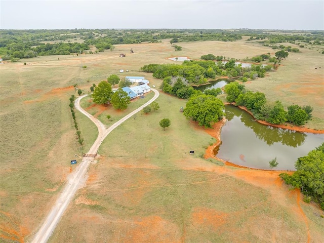 aerial view featuring a water view and a rural view