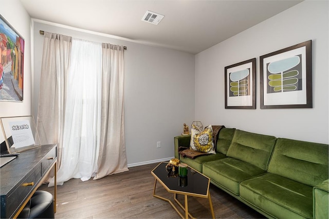 living room with dark wood-type flooring