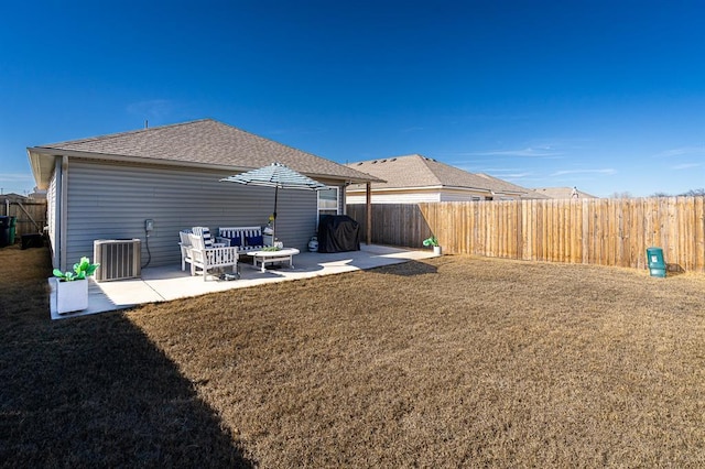 back of house with a yard, central AC, and a patio