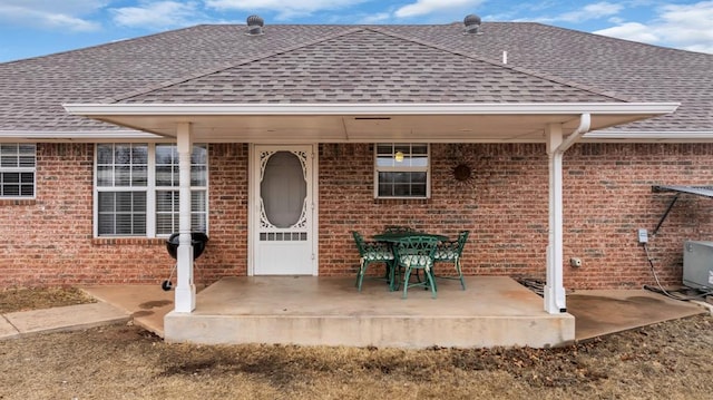 rear view of property with a patio area