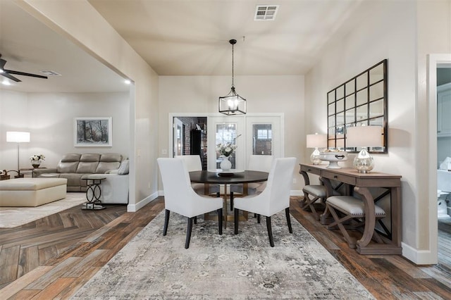 dining space featuring ceiling fan and dark hardwood / wood-style floors