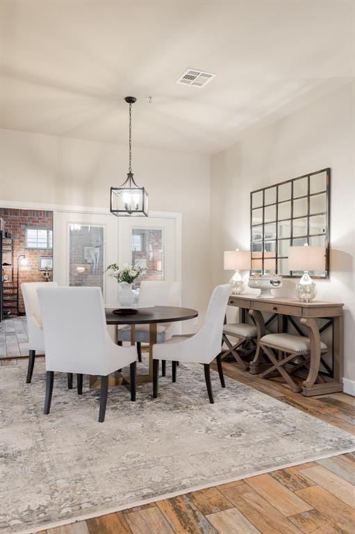 dining area featuring hardwood / wood-style flooring