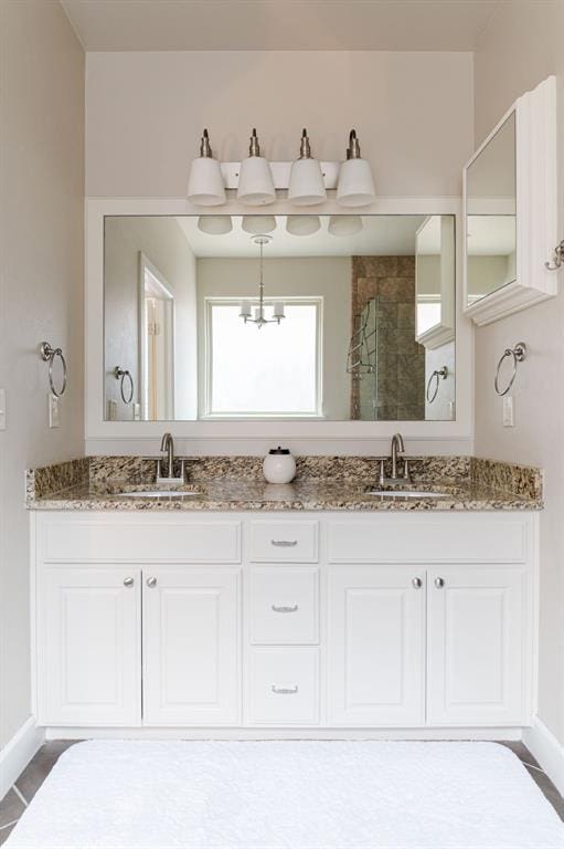 bathroom with vanity and walk in shower