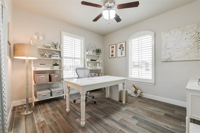 office with ceiling fan and dark hardwood / wood-style flooring