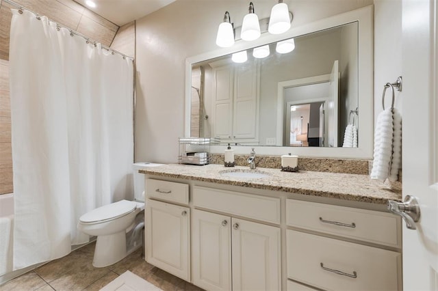 bathroom with tile patterned flooring, vanity, a shower with curtain, and toilet