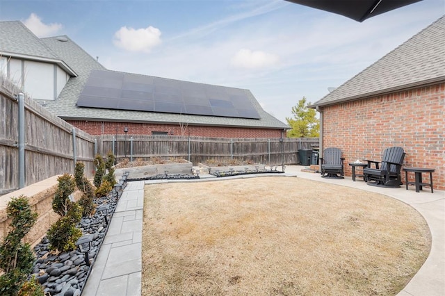 view of patio / terrace featuring an outdoor fire pit