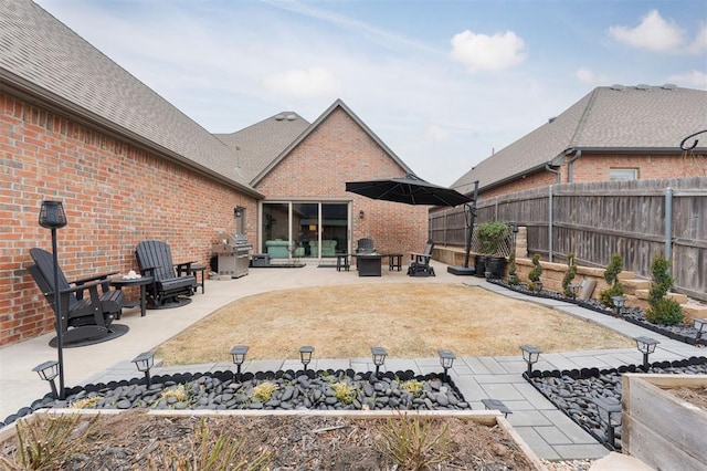 back of house featuring a patio