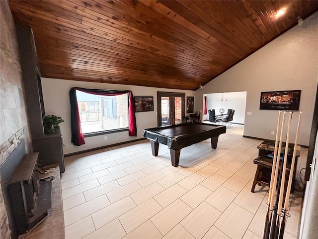 game room featuring french doors, pool table, vaulted ceiling, and wooden ceiling