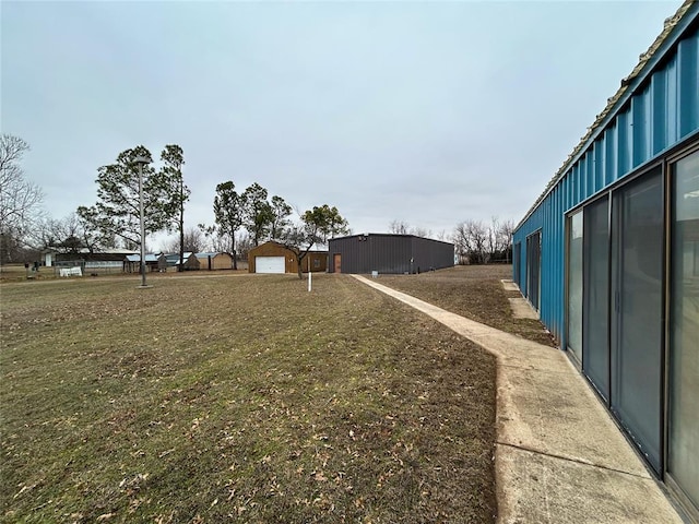 view of yard featuring a garage