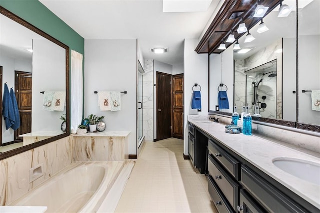 bathroom featuring independent shower and bath and vanity