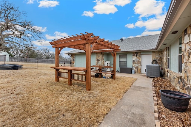 view of patio / terrace with cooling unit and a pergola