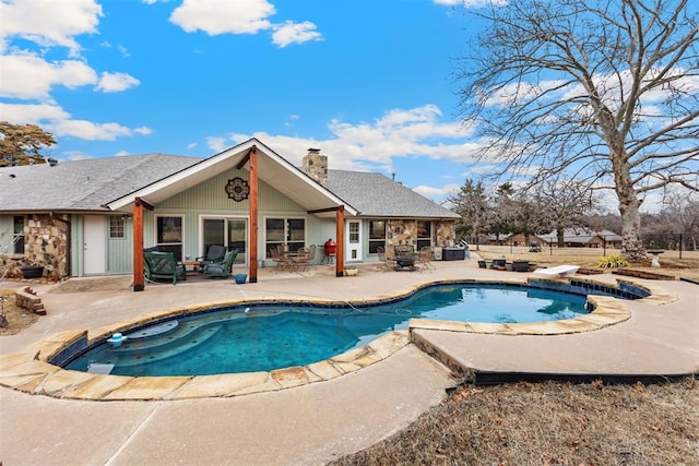 view of pool with a patio area