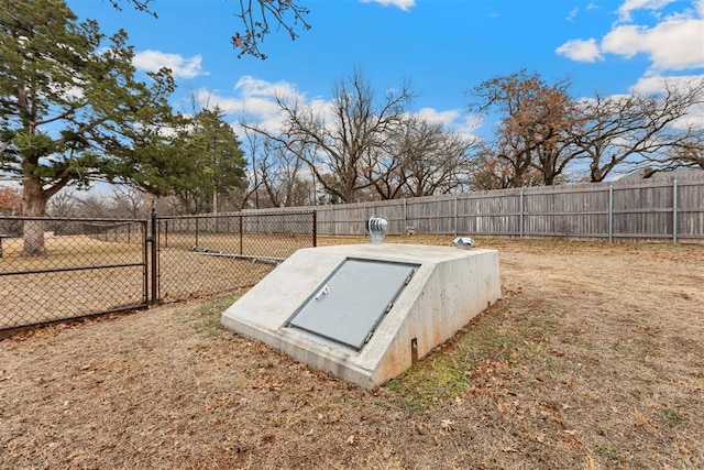 entry to storm shelter with a lawn