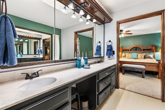 bathroom with vanity and ceiling fan