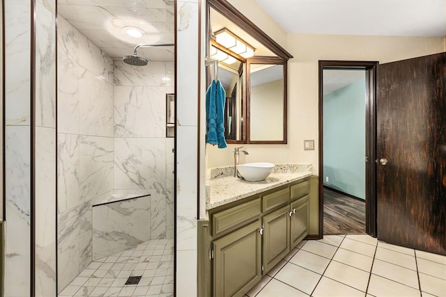 bathroom with vanity and an enclosed shower