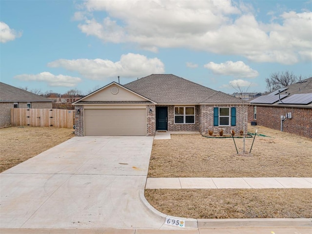 ranch-style home with a garage