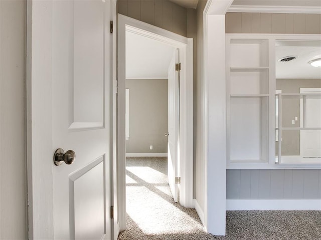 hallway featuring carpet flooring