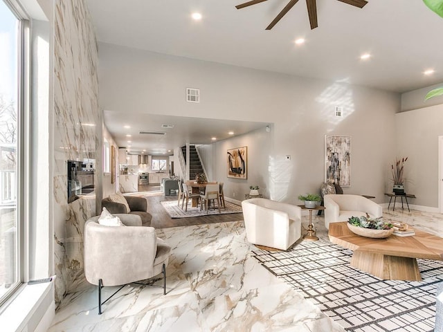 living room featuring ceiling fan