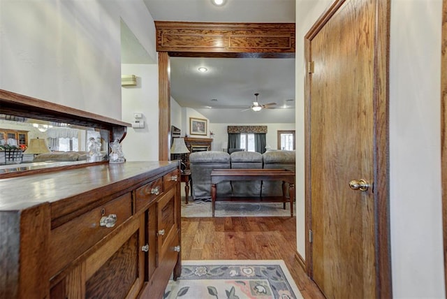 interior space featuring lofted ceiling and wood finished floors