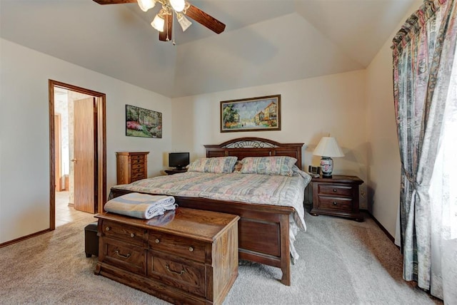 bedroom with lofted ceiling, light carpet, ceiling fan, and baseboards