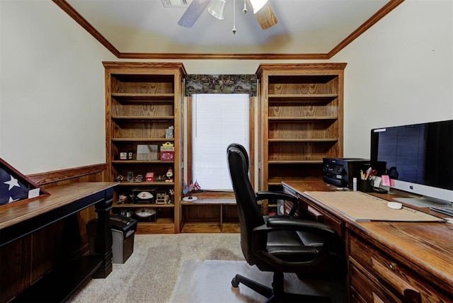 office area with a wainscoted wall, ceiling fan, ornamental molding, and carpet floors