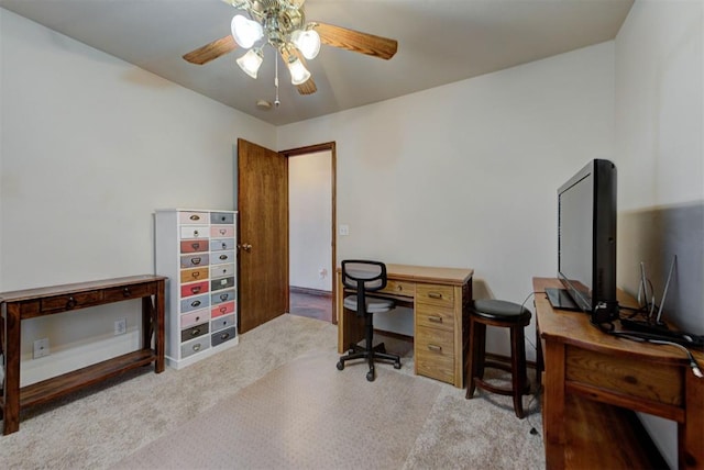 office featuring carpet and a ceiling fan