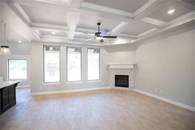 3105 Feather Dr, Yukon, OK 73099 - unfurnished living room with a ceiling fan, a fireplace, beam ceiling, light wood-style floors, and coffered ceiling