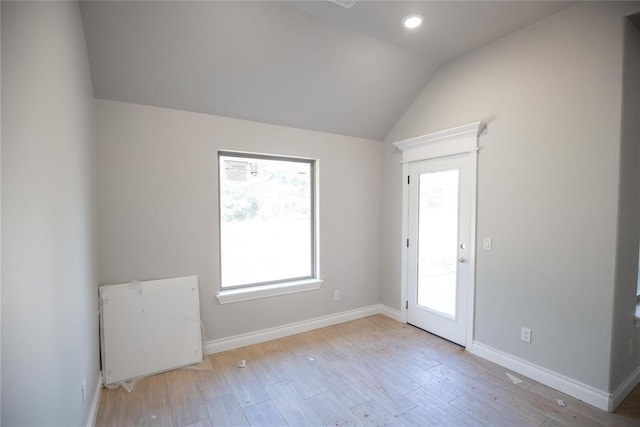 3105 Feather Dr, Yukon, OK 73099 - unfurnished room featuring vaulted ceiling, hardwood / wood-style flooring, healthy amount of natural light, and recessed lighting