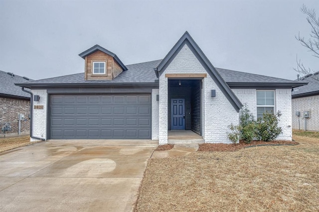 view of front of home featuring a garage