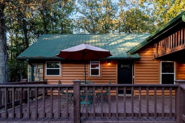 rear view of house with a deck